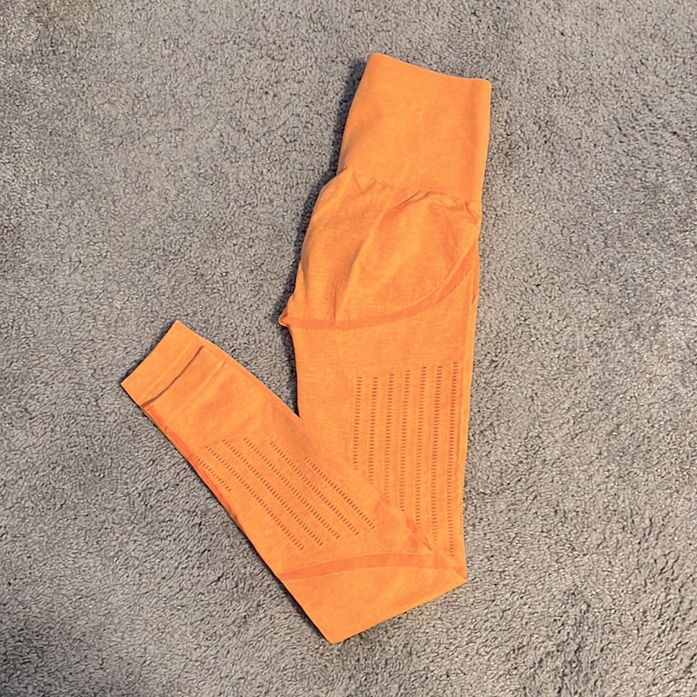 Athletic leggings, Light bright orange in colour, size small